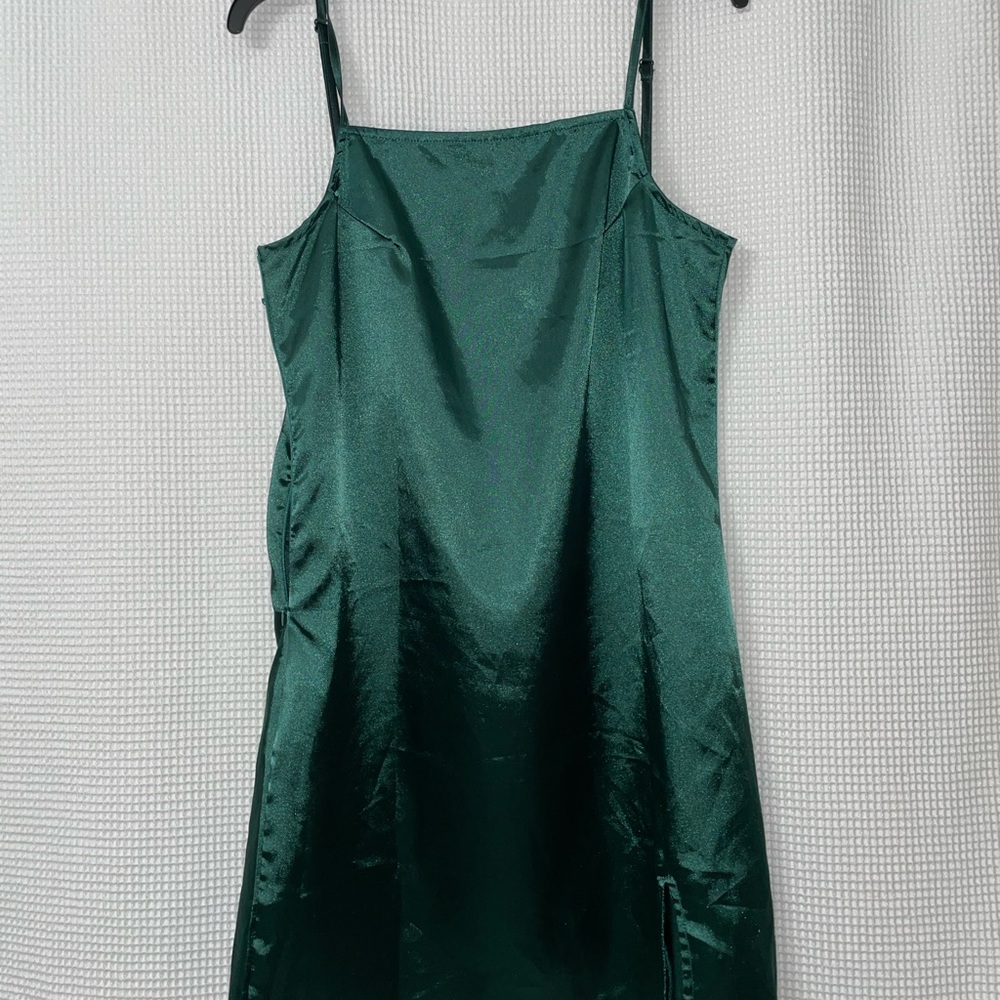 Green satin, slit mini dress.